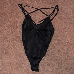 Strappy body suit with mesh detail